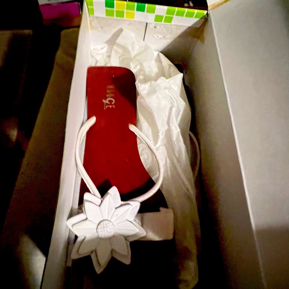 Unique white and a brown wood bottom size 8